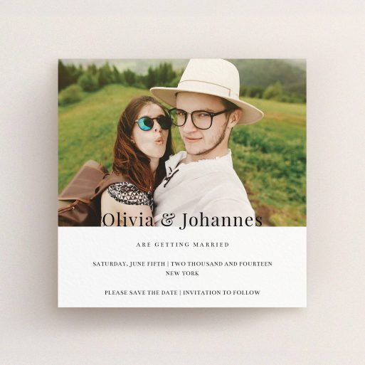 A wedding save the date template titled "On the fence". It is a square (148mm x 148mm) save the date in a square orientation. It is a photographic wedding save the date with room for 1 photo. "On the fence" is available as a flat save the date, with mainly white colouring.