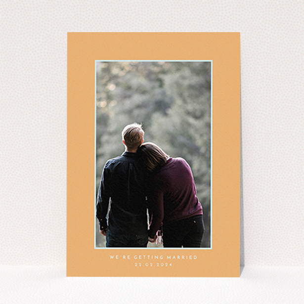 A wedding save the date template titled "Orange Mint Photo Frame". It is an A6 save the date in a portrait orientation. It is a photographic wedding save the date with room for 1 photo. "Orange Mint Photo Frame" is available as a flat save the date, with tones of orange and blue.