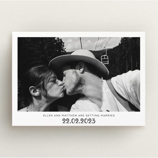 A wedding save the date design titled "Ornate Date". It is an A5 save the date in a landscape orientation. It is a photographic wedding save the date with room for 1 photo. "Ornate Date" is available as a flat save the date, with mainly white colouring.