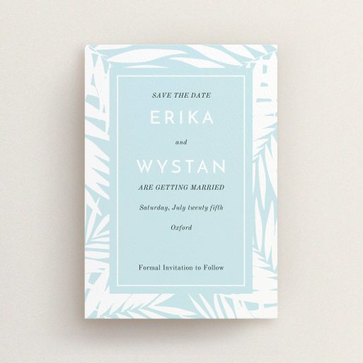 A wedding save the date template titled "Pastel Jungle". It is an A6 save the date in a portrait orientation. "Pastel Jungle" is available as a flat save the date, with tones of blue and white.
