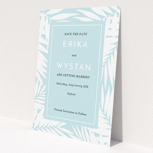 A wedding save the date template titled 'Pastel Jungle'. It is an A6 save the date in a portrait orientation. 'Pastel Jungle' is available as a flat save the date, with tones of blue and white.