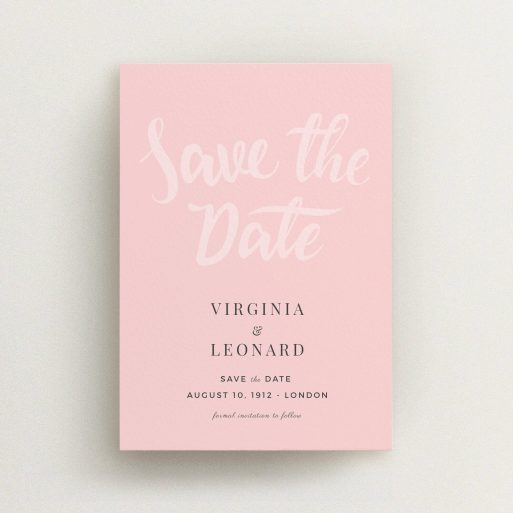 A wedding save the date design named "Pink on Rose Typography". It is an A6 save the date in a portrait orientation. "Pink on Rose Typography" is available as a flat save the date, with mainly pink colouring.