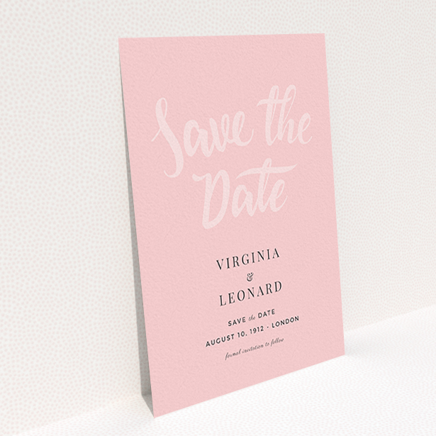 A wedding save the date design named "Pink on Rose Typography". It is an A6 save the date in a portrait orientation. "Pink on Rose Typography" is available as a flat save the date, with mainly pink colouring.