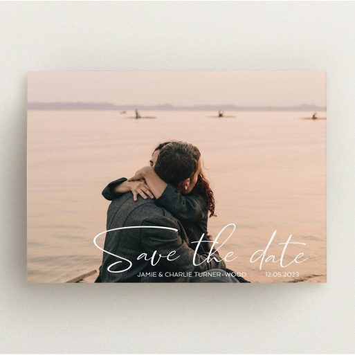 A wedding save the date named "Salamanca". It is an A5 save the date in a landscape orientation. It is a photographic wedding save the date with room for 1 photo. "Salamanca" is available as a flat save the date, with mainly white colouring.