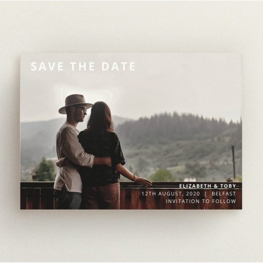 A wedding save the date design called "Sans Serif". It is an A5 save the date in a landscape orientation. It is a photographic wedding save the date with room for 1 photo. "Sans Serif" is available as a flat save the date, with mainly white colouring.