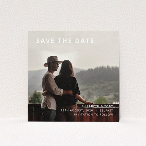 A wedding save the date design called "Sans Serif". It is a square (148mm x 148mm) save the date in a square orientation. It is a photographic wedding save the date with room for 1 photo. "Sans Serif" is available as a flat save the date, with mainly white colouring.