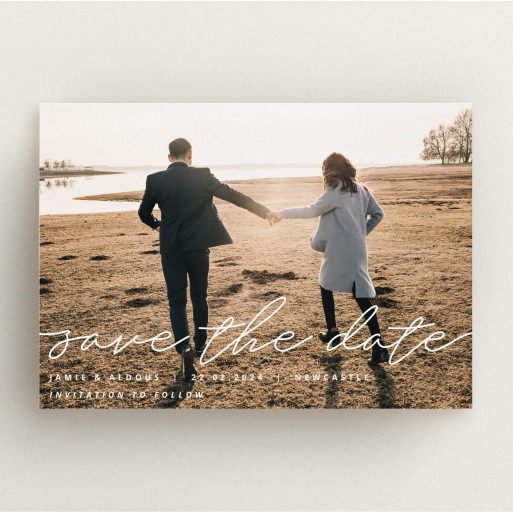 A wedding save the date design titled "Save the Date Script". It is an A5 save the date in a landscape orientation. It is a photographic wedding save the date with room for 1 photo. "Save the Date Script" is available as a flat save the date, with mainly white colouring.