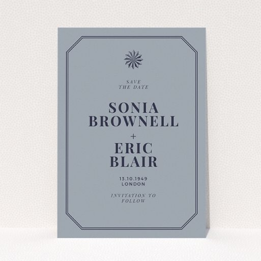 A wedding save the date template titled "Shaded sundial". It is an A5 save the date in a portrait orientation. "Shaded sundial" is available as a flat save the date, with tones of dark grey and navy blue.