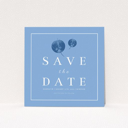 A wedding save the date called "Shanghai Nights". It is a square (148mm x 148mm) save the date in a square orientation. "Shanghai Nights" is available as a flat save the date, with mainly blue colouring.