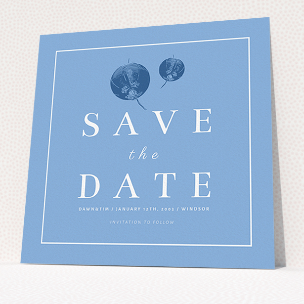 A wedding save the date called "Shanghai Nights". It is a square (148mm x 148mm) save the date in a square orientation. "Shanghai Nights" is available as a flat save the date, with mainly blue colouring.