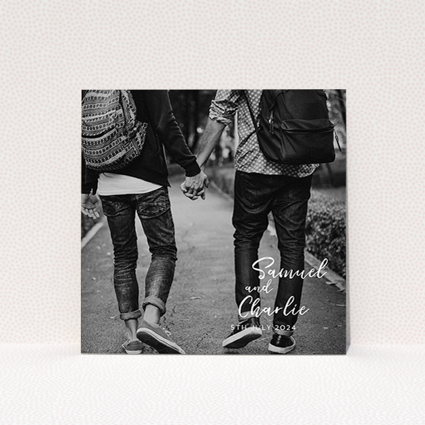 A wedding save the date named "Soho Script". It is a square (148mm x 148mm) save the date in a square orientation. It is a photographic wedding save the date with room for 1 photo. "Soho Script" is available as a flat save the date, with mainly white colouring.