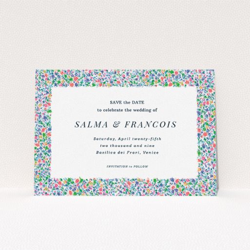 A wedding save the date named "The faraway garden". It is an A5 save the date in a landscape orientation. "The faraway garden" is available as a flat save the date, with tones of white, blue and green.