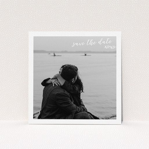 A wedding save the date called "Thick White Framed Photo". It is a square (148mm x 148mm) save the date in a square orientation. It is a photographic wedding save the date with room for 1 photo. "Thick White Framed Photo" is available as a flat save the date, with mainly white colouring.