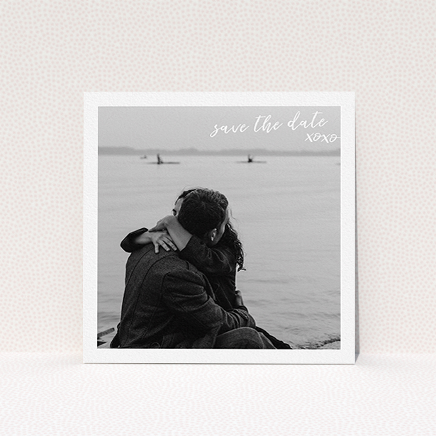 A wedding save the date called "Thick White Framed Photo". It is a square (148mm x 148mm) save the date in a square orientation. It is a photographic wedding save the date with room for 1 photo. "Thick White Framed Photo" is available as a flat save the date, with mainly white colouring.