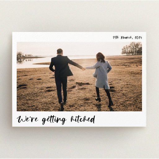 A wedding save the date design called "Top and Bottom Photo". It is an A5 save the date in a landscape orientation. It is a photographic wedding save the date with room for 1 photo. "Top and Bottom Photo" is available as a flat save the date, with mainly white colouring.