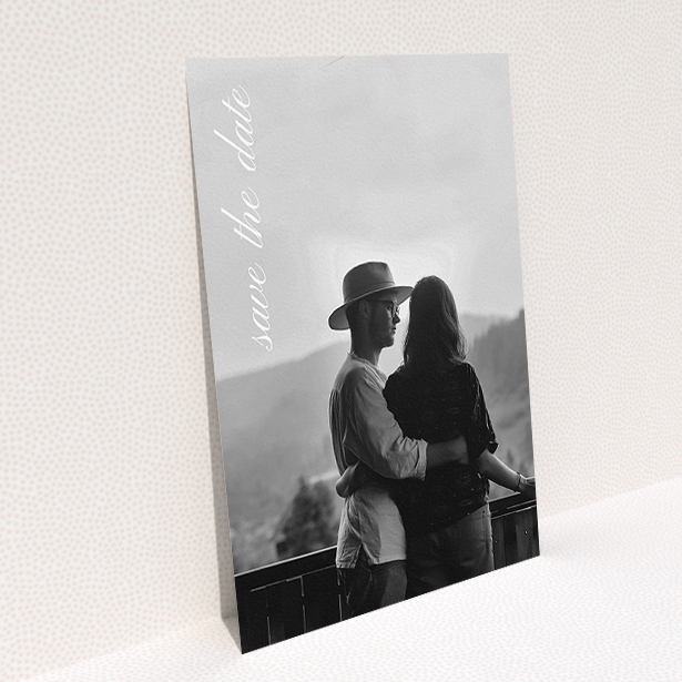 A wedding save the date template titled "Up the side". It is an A5 save the date in a portrait orientation. It is a photographic wedding save the date with room for 1 photo. "Up the side" is available as a flat save the date, with mainly white colouring.