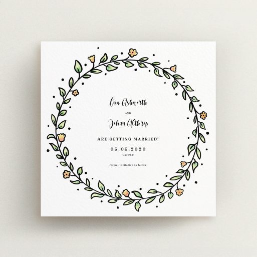 A wedding save the date template titled "Wreath Outline". It is a square (148mm x 148mm) save the date in a square orientation. "Wreath Outline" is available as a flat save the date, with tones of light green and orange.