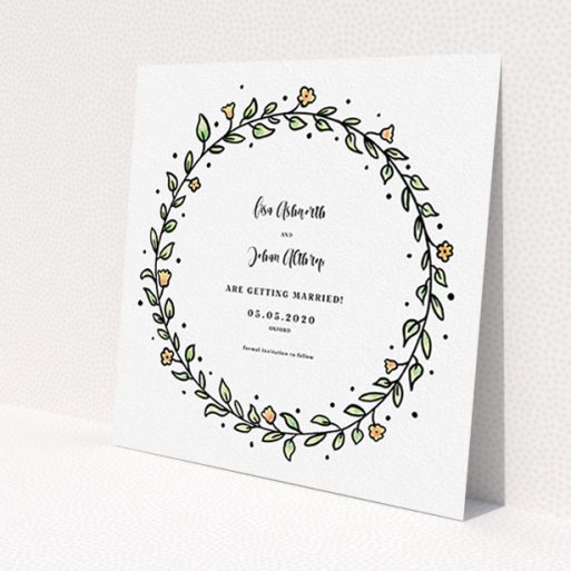 A wedding save the date template titled 'Wreath Outline'. It is a square (148mm x 148mm) save the date in a square orientation. 'Wreath Outline' is available as a flat save the date, with tones of light green and orange.