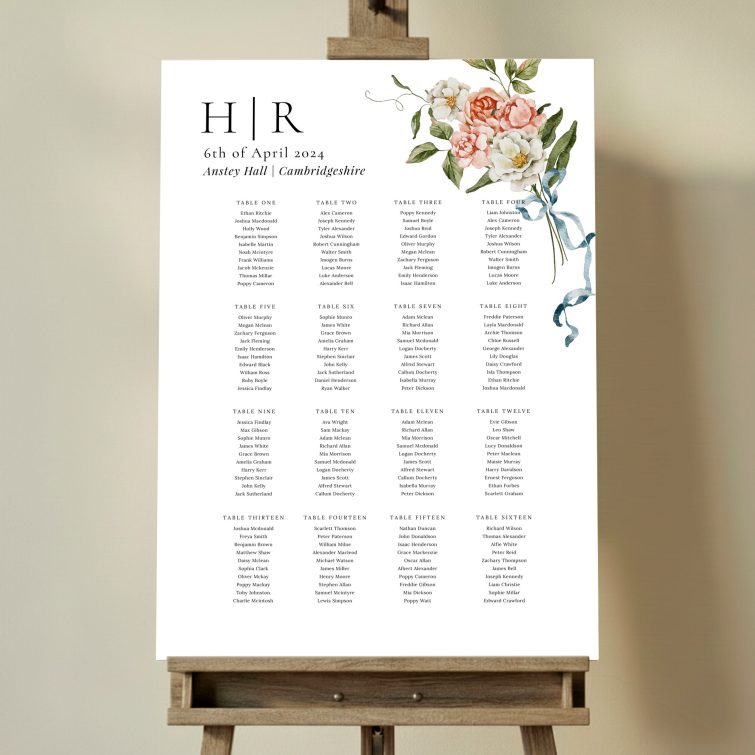 Elegant wedding table plan with floral design elements and sixteen tables, featuring one decorative image. This one shows 16 tables.