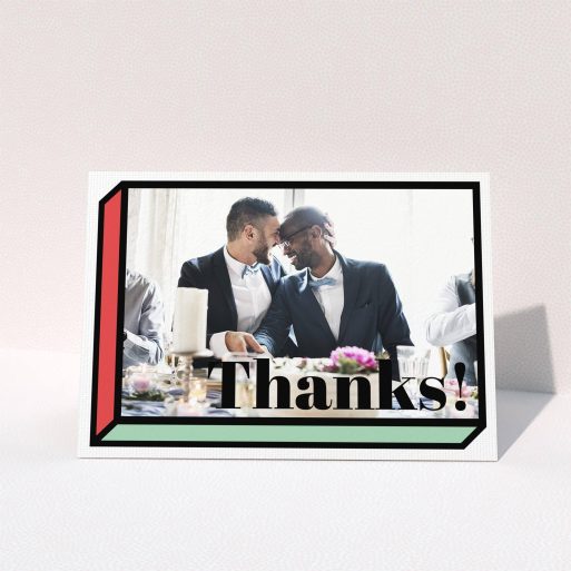A wedding thank you card called "3D Thank You". It is an A6 card in a landscape orientation. It is a photographic wedding thank you card with room for 1 photo. "3D Thank You" is available as a folded card, with tones of red, green and black.