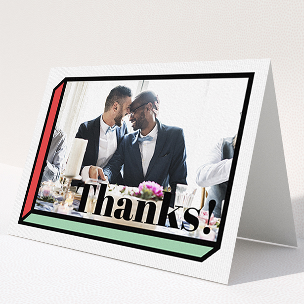 A wedding thank you card called "3D Thank You". It is an A6 card in a landscape orientation. It is a photographic wedding thank you card with room for 1 photo. "3D Thank You" is available as a folded card, with tones of red, green and black.