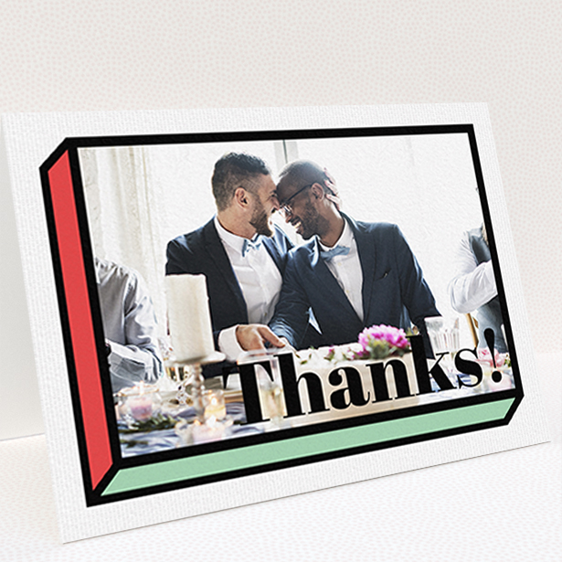 A wedding thank you card called "3D Thank You". It is an A6 card in a landscape orientation. It is a photographic wedding thank you card with room for 1 photo. "3D Thank You" is available as a folded card, with tones of red, green and black.