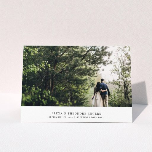 A wedding thank you card called "A Modern Classic Thank You". It is an A5 card in a landscape orientation. It is a photographic wedding thank you card with room for 1 photo. "A Modern Classic Thank You" is available as a folded card, with mainly white colouring.