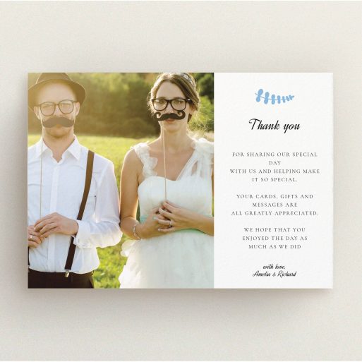 A wedding thank you card named "Abstract blue thanks". It is an A5 card in a landscape orientation. It is a photographic wedding thank you card with room for 1 photo. "Abstract blue thanks" is available as a flat card, with tones of white and blue.
