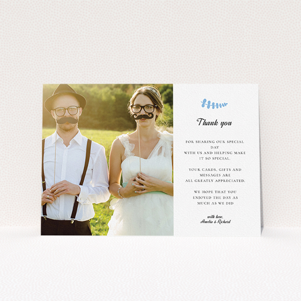 A wedding thank you card named "Abstract blue thanks". It is an A5 card in a landscape orientation. It is a photographic wedding thank you card with room for 1 photo. "Abstract blue thanks" is available as a flat card, with tones of white and blue.