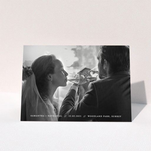 Wedding Thank You Card Design - "Along the bottom" A wedding thank you card design called "Along the bottom". It is an A5 card in a landscape orientation. It is a photographic wedding thank you card with room for 1 photo. "Along the bottom" is available as a folded card, with mainly white colouring.