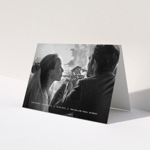 A wedding thank you card design called 'Along the bottom'. It is an A5 card in a landscape orientation. It is a photographic wedding thank you card with room for 1 photo. 'Along the bottom' is available as a folded card, with mainly white colouring.