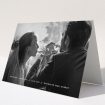 A wedding thank you card design called "Along the bottom". It is an A5 card in a landscape orientation. It is a photographic wedding thank you card with room for 1 photo. "Along the bottom" is available as a folded card, with mainly white colouring.
