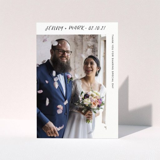 A wedding thank you card design named "Around the Corner Photo". It is an A5 card in a portrait orientation. It is a photographic wedding thank you card with room for 1 photo. "Around the Corner Photo" is available as a folded card, with mainly white colouring.