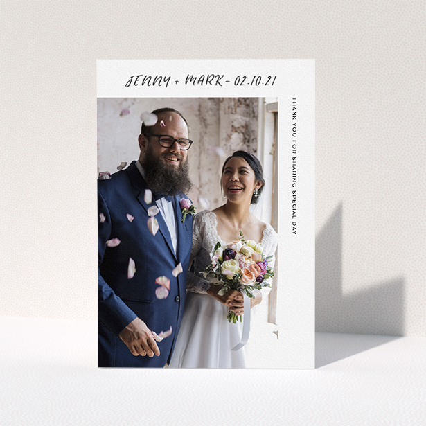 A wedding thank you card design named "Around the Corner Photo". It is an A5 card in a portrait orientation. It is a photographic wedding thank you card with room for 1 photo. "Around the Corner Photo" is available as a folded card, with mainly white colouring.