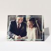 A wedding thank you card called "Blue White Photo Frame". It is an A5 card in a landscape orientation. It is a photographic wedding thank you card with room for 1 photo. "Blue White Photo Frame" is available as a folded card, with mainly blue colouring.