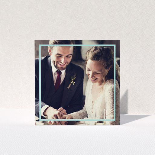 A wedding thank you card called "Blue White Photo Frame". It is a square (148mm x 148mm) card in a square orientation. It is a photographic wedding thank you card with room for 1 photo. "Blue White Photo Frame" is available as a folded card, with mainly blue colouring.