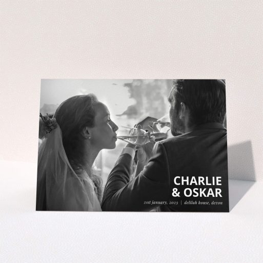 A wedding thank you card design named "Bold Photo Corner". It is an A5 card in a landscape orientation. It is a photographic wedding thank you card with room for 1 photo. "Bold Photo Corner" is available as a folded card, with mainly white colouring.