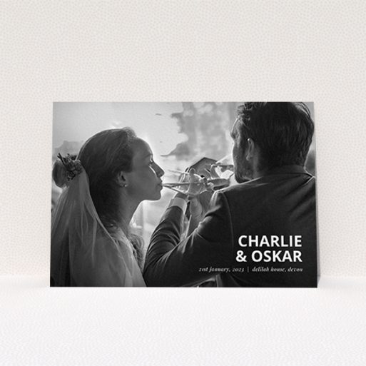 A wedding thank you card named "Bold Photo Corner". It is an A6 card in a landscape orientation. It is a photographic wedding thank you card with room for 1 photo. "Bold Photo Corner" is available as a flat card, with mainly white colouring.
