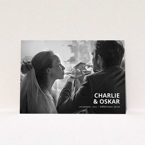 A wedding thank you card named "Bold Photo Corner". It is an A6 card in a landscape orientation. It is a photographic wedding thank you card with room for 1 photo. "Bold Photo Corner" is available as a flat card, with mainly white colouring.