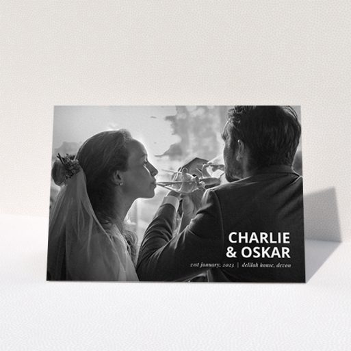 A wedding thank you card design called "Bold Photo Corner". It is an A6 card in a landscape orientation. It is a photographic wedding thank you card with room for 1 photo. "Bold Photo Corner" is available as a folded card, with mainly white colouring.