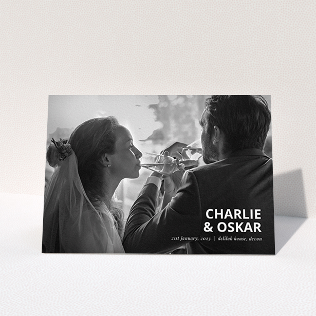 A wedding thank you card design called "Bold Photo Corner". It is an A6 card in a landscape orientation. It is a photographic wedding thank you card with room for 1 photo. "Bold Photo Corner" is available as a folded card, with mainly white colouring.