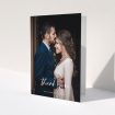 A wedding thank you card design titled "Calligraphy Thanks". It is an A5 card in a portrait orientation. It is a photographic wedding thank you card with room for 1 photo. "Calligraphy Thanks" is available as a folded card, with mainly white colouring.