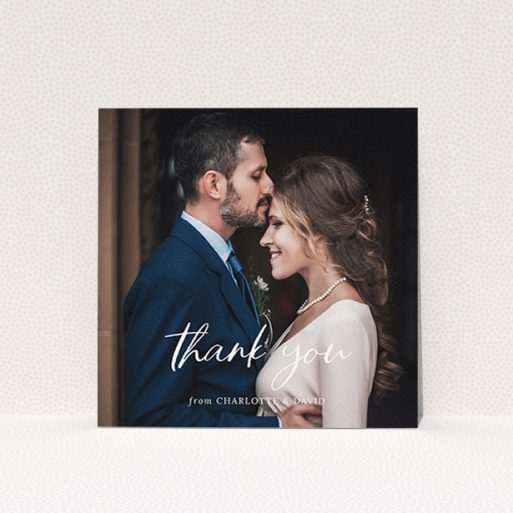 A wedding thank you card design called "Calligraphy Thanks". It is a square (148mm x 148mm) card in a square orientation. It is a photographic wedding thank you card with room for 1 photo. "Calligraphy Thanks" is available as a flat card, with mainly white colouring.