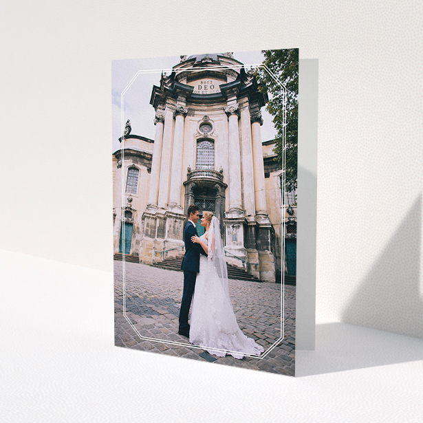 A wedding thank you card design called "Chiselled border". It is an A5 card in a portrait orientation. It is a photographic wedding thank you card with room for 1 photo. "Chiselled border" is available as a folded card, with mainly white colouring.