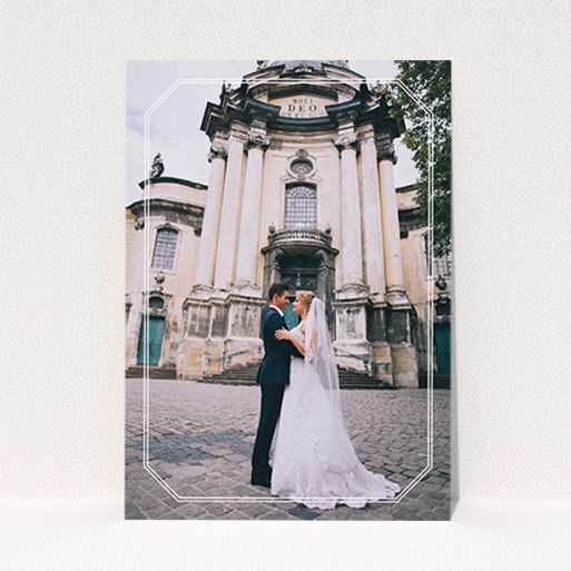 A wedding thank you card design called "Chiselled border". It is an A6 card in a portrait orientation. It is a photographic wedding thank you card with room for 1 photo. "Chiselled border" is available as a flat card, with mainly white colouring.