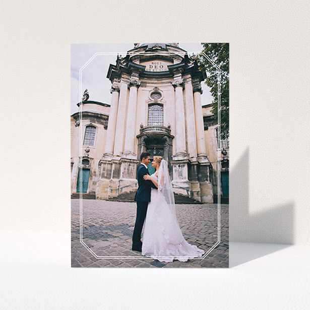 A wedding thank you card design titled "Chiselled border". It is an A6 card in a portrait orientation. It is a photographic wedding thank you card with room for 1 photo. "Chiselled border" is available as a folded card, with mainly white colouring.