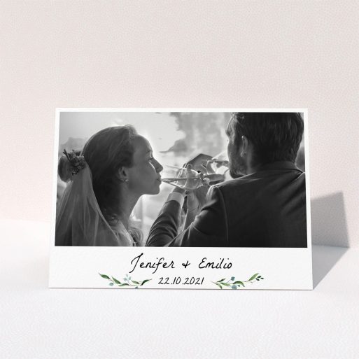 A wedding thank you card named "Classic Floral". It is an A5 card in a landscape orientation. It is a photographic wedding thank you card with room for 1 photo. "Classic Floral" is available as a folded card, with tones of green and white.