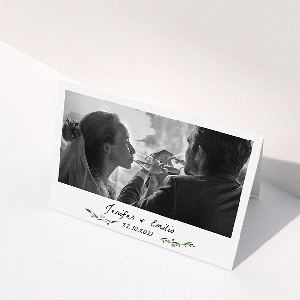 A wedding thank you card named "Classic Floral". It is an A5 card in a landscape orientation. It is a photographic wedding thank you card with room for 1 photo. "Classic Floral" is available as a folded card, with tones of green and white.