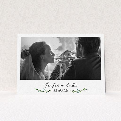 A wedding thank you card design named "Classic Floral". It is an A6 card in a landscape orientation. It is a photographic wedding thank you card with room for 1 photo. "Classic Floral" is available as a flat card, with tones of green and white.