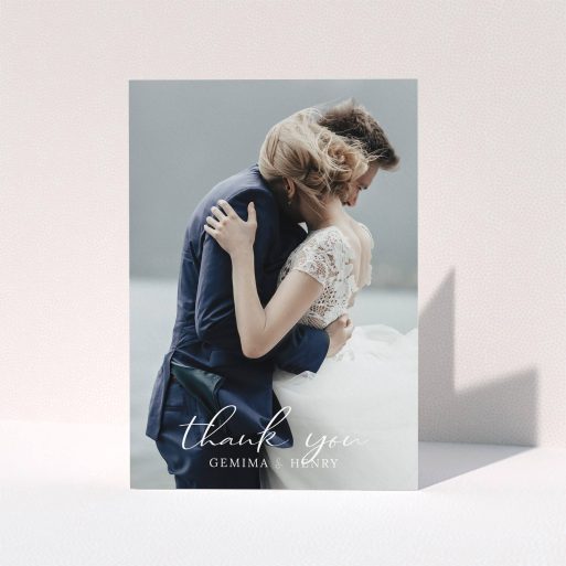 A wedding thank you card template titled "Classic Thank You". It is an A5 card in a portrait orientation. It is a photographic wedding thank you card with room for 1 photo. "Classic Thank You" is available as a folded card, with mainly white colouring.